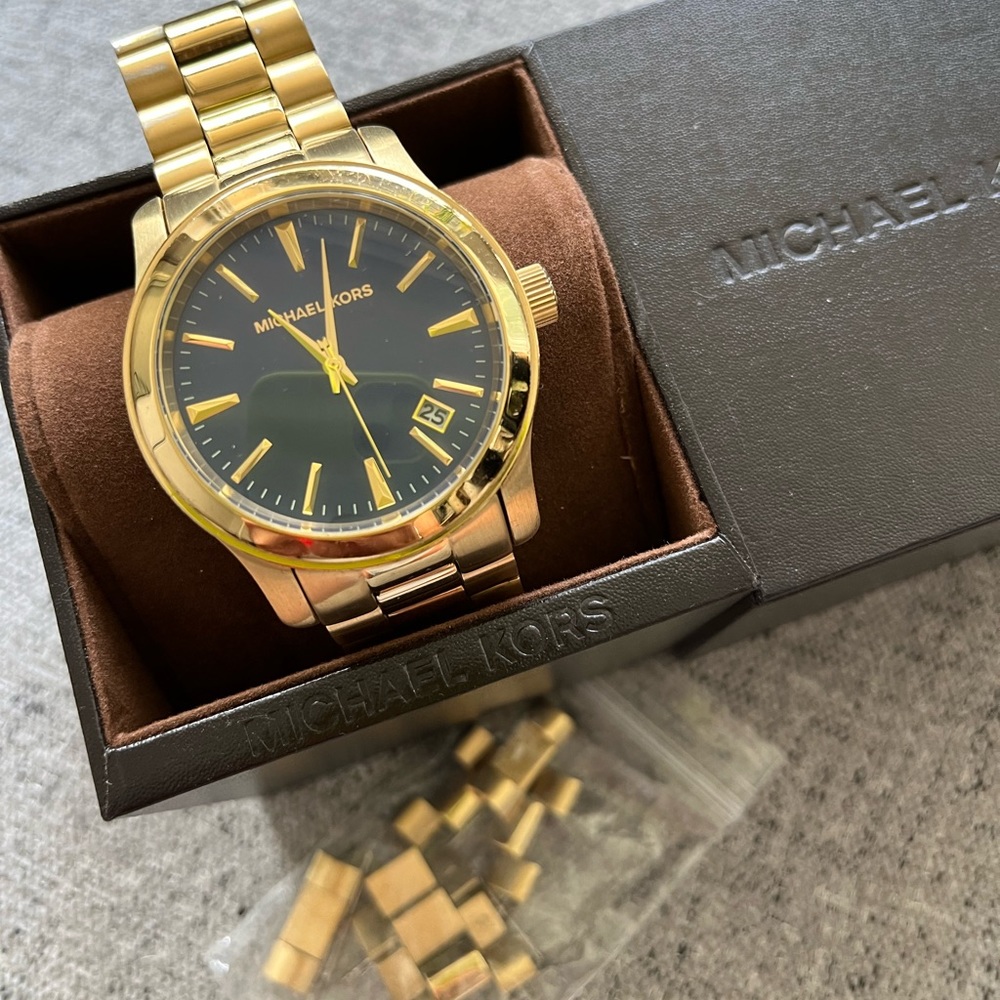 Call Michael Kors watch with Blue face.